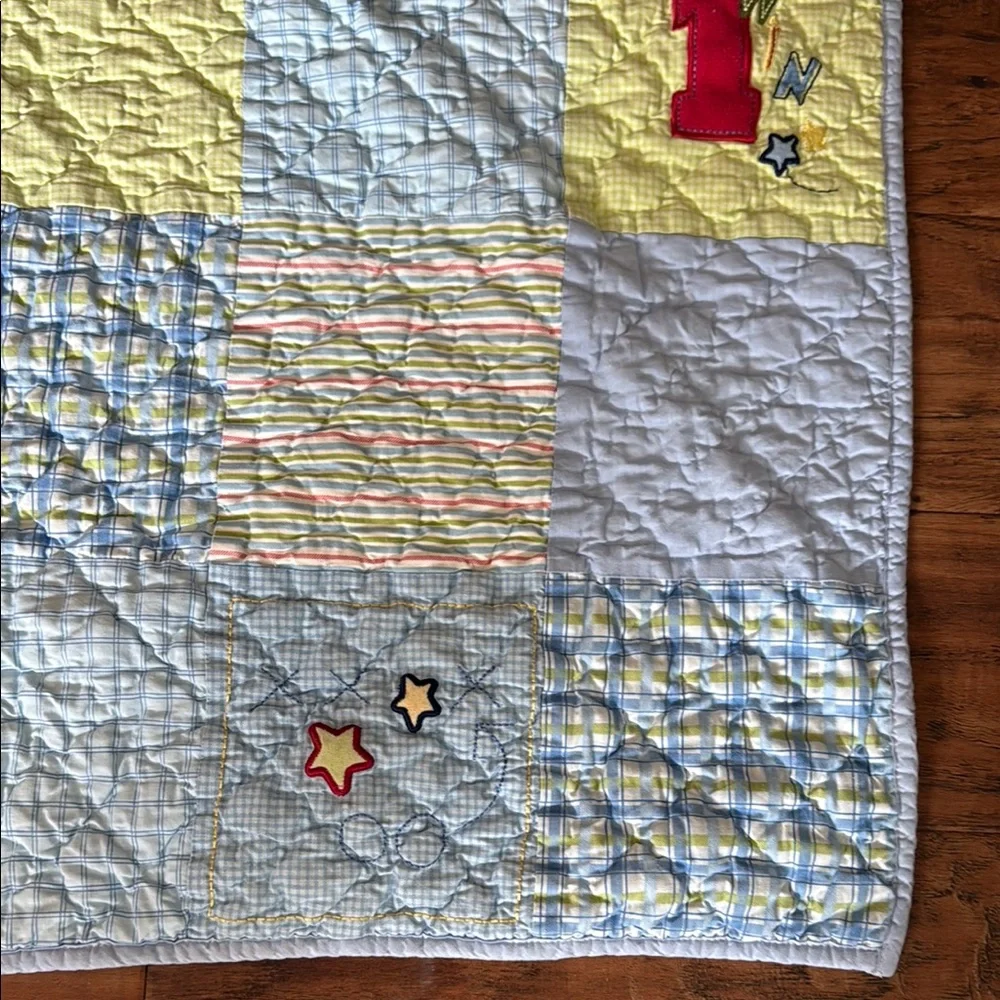 Varsity Baby Quilt with Red and Yellow Accents. Home quilted